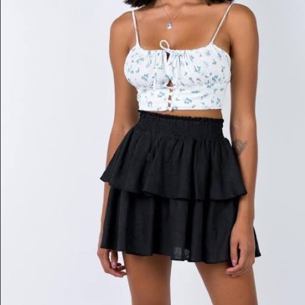 Black ruffle mini skirt